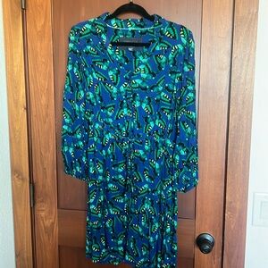 Maeve knee length dress butterfly pattern in blue, green, yellow and black.